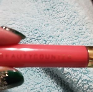Beautycounter lip gloss ...peony